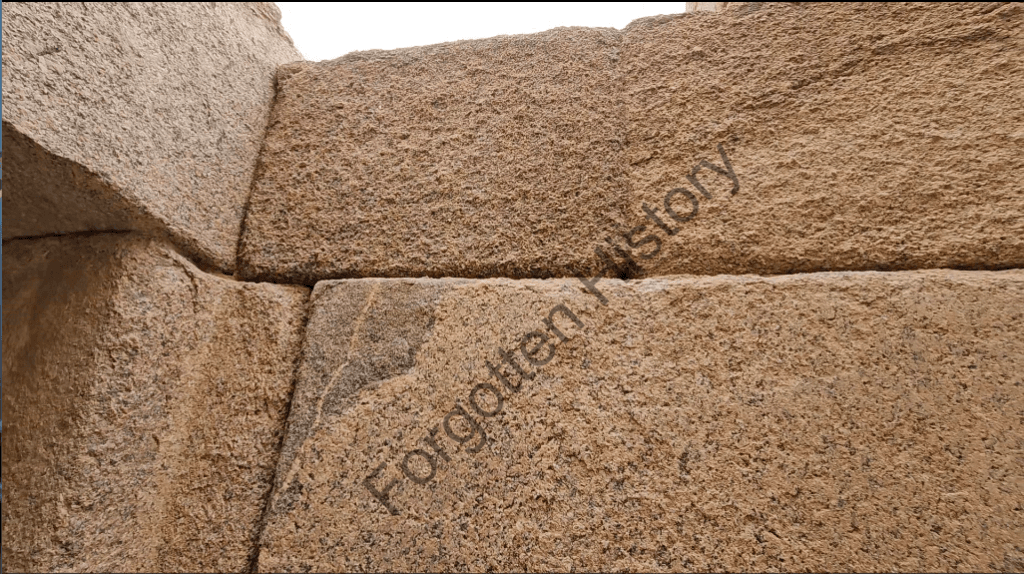 internal right angles directly into massive granite blocks at the valley Temple